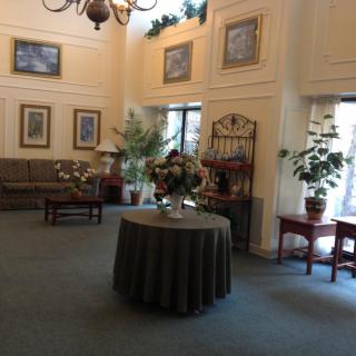 A well-decorated lobby with comfortable seating and elegant decor.