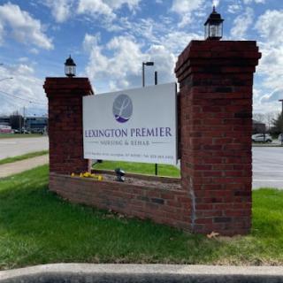 The entrance sign for Lexington Premier, showcasing a welcoming atmosphere.