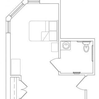 A simple floor plan showcasing a bedroom with an attached bathroom.