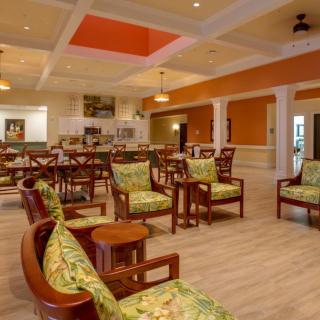 A cozy lounge with vibrant furniture and a welcoming atmosphere.