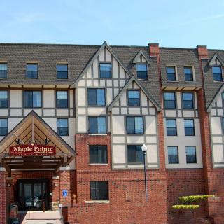 A Tudor-style hotel with a brick exterior.