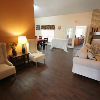 A cozy living room with stylish furniture and a warm ambiance.
