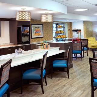 A modern lounge area with comfortable seating and stylish decor.