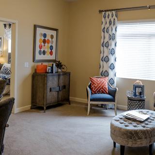 A cozy living room with comfortable seating and modern decor.