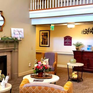A cozy living room with elegant decor and comfortable seating.