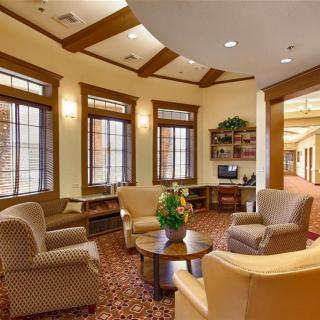 Cozy lobby area with comfortable seating and warm lighting.