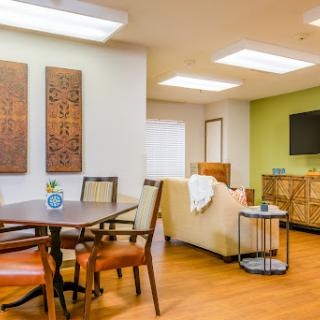 A stylish and cozy living room featuring modern furniture and decorative elements.