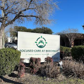 Sign of Focused Care at Reedsville facility surrounded by greenery.