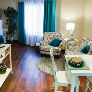 A cozy living room with elegant decor and comfortable furnishings.