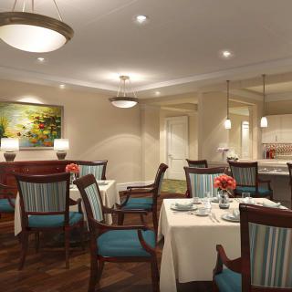 A well-decorated dining area with elegant furniture and ambient lighting.