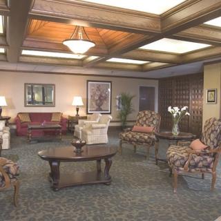 A cozy hotel lobby with comfortable seating and elegant decor.