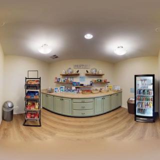 A well-stocked kitchen pantry with snacks and beverages.