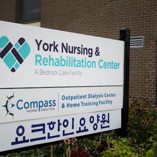 Signage for York Nursing & Rehabilitation Center, highlighting its services.