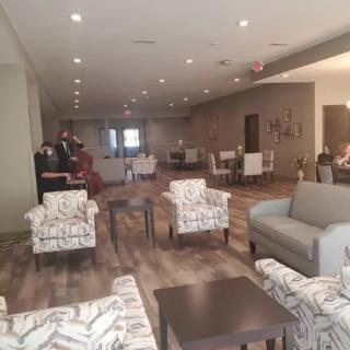 A modern lounge with comfortable seating and elegant decor.