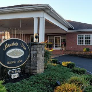 Entrance to Mountain View, showcasing the inviting exterior and well-maintained landscaping.