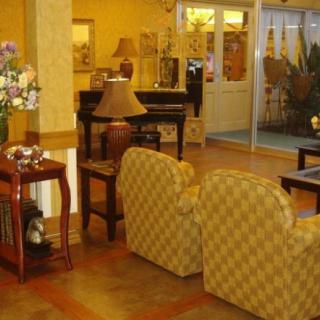 A cozy lobby area with comfortable seating and warm lighting.