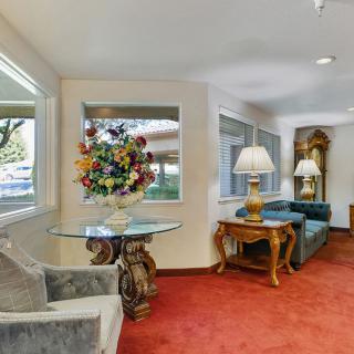 A cozy living room with plush furniture and elegant decor.