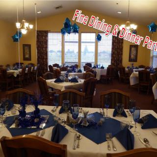 A dining room decorated with a blue theme for a special event.