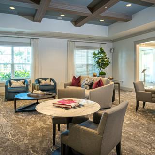 A modern living room with comfortable seating and stylish decor.