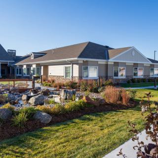 A well-maintained suburban house with a landscaped garden.