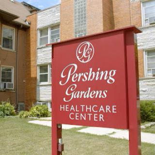 Sign for Pershing Gardens Healthcare Center located outside the facility.