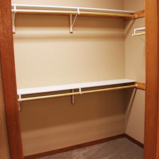 A spacious empty closet ready for organization.