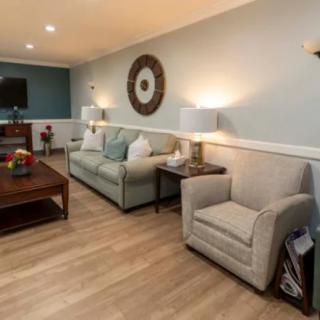 A cozy living room with comfortable seating and stylish decor.