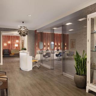 A modern reception area with stylish decor and comfortable seating.