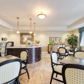 A cozy dining area with modern decor and comfortable seating.