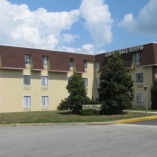 A hotel building under a partly cloudy sky.