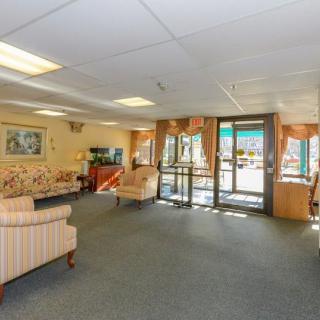 A spacious lobby with comfortable seating and ample natural light.