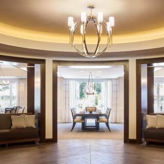 A luxurious lobby with elegant chandeliers and plush seating areas.