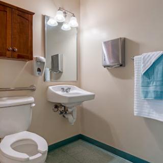 A clean and modern bathroom featuring essential fixtures.