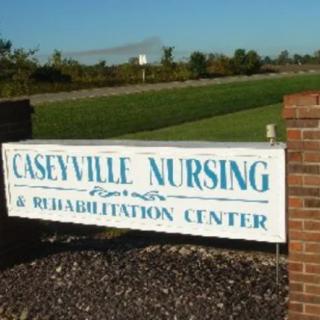 Sign for Caseyville Nursing & Rehabilitation Center mounted on a brick wall.