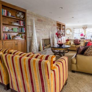 A cozy living room with comfortable seating and tasteful decor.