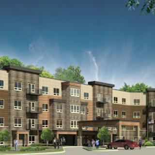 A modern apartment complex showcasing stylish architecture and a welcoming environment.