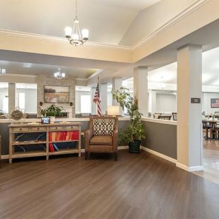 A spacious and elegantly decorated lobby with comfortable seating and modern lighting.