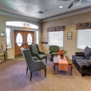 A cozy living room with comfortable seating and warm decor.