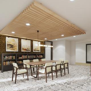 A contemporary meeting room featuring a wooden ceiling, elegant furniture, and artistic wall decor.