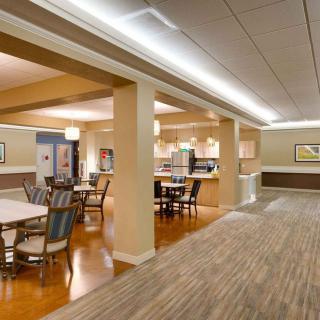 A spacious and well-lit dining area with modern furnishings.