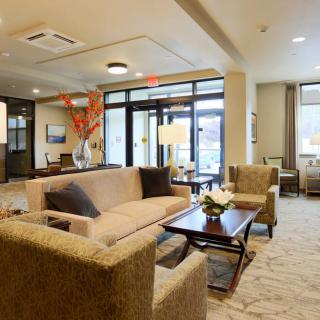 A modern lobby with comfortable seating and stylish decor.