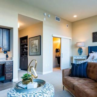 A modern, well-decorated living room with stylish furniture and a cozy atmosphere.