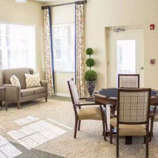 A cozy living space with elegant furnishings and natural light.