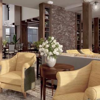 A modern living room with comfortable seating and elegant decor.