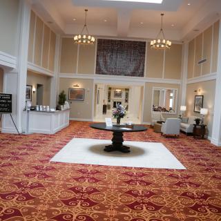 Elegant hotel lobby with high ceilings and stylish decor.