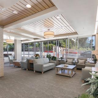 A modern lobby with comfortable seating and natural lighting.