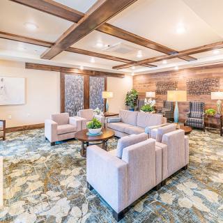 Modern living room with comfortable seating and stylish decor.