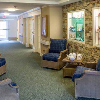 A cozy lobby interior with comfortable seating and decorative elements.