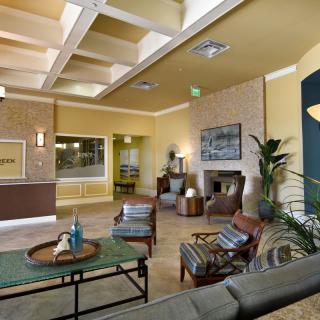 A modern lobby with comfortable seating and tasteful decor.