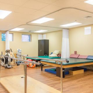 A well-equipped physical therapy room designed for rehabilitation exercises.